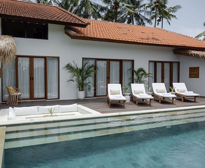 Gaia Room interior at luxury Bali retreat in Ubud – tropical decor, natural wood accents, and serene setting for a wellness getaway