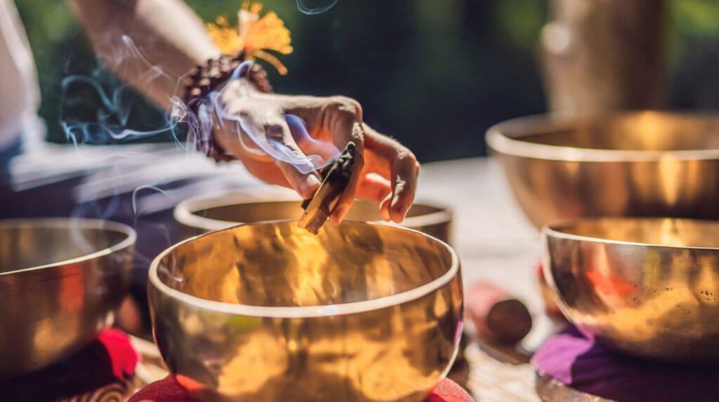Tranquil Ubud sound healing retreat with crystal singing bowls, meditation, and a lush jungle backdrop for deep relaxation and rejuvenation